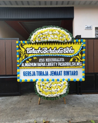 Papan Bunga Duka di Paniki Satu